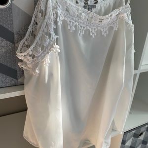 Sheer white off the shoulder blouse.